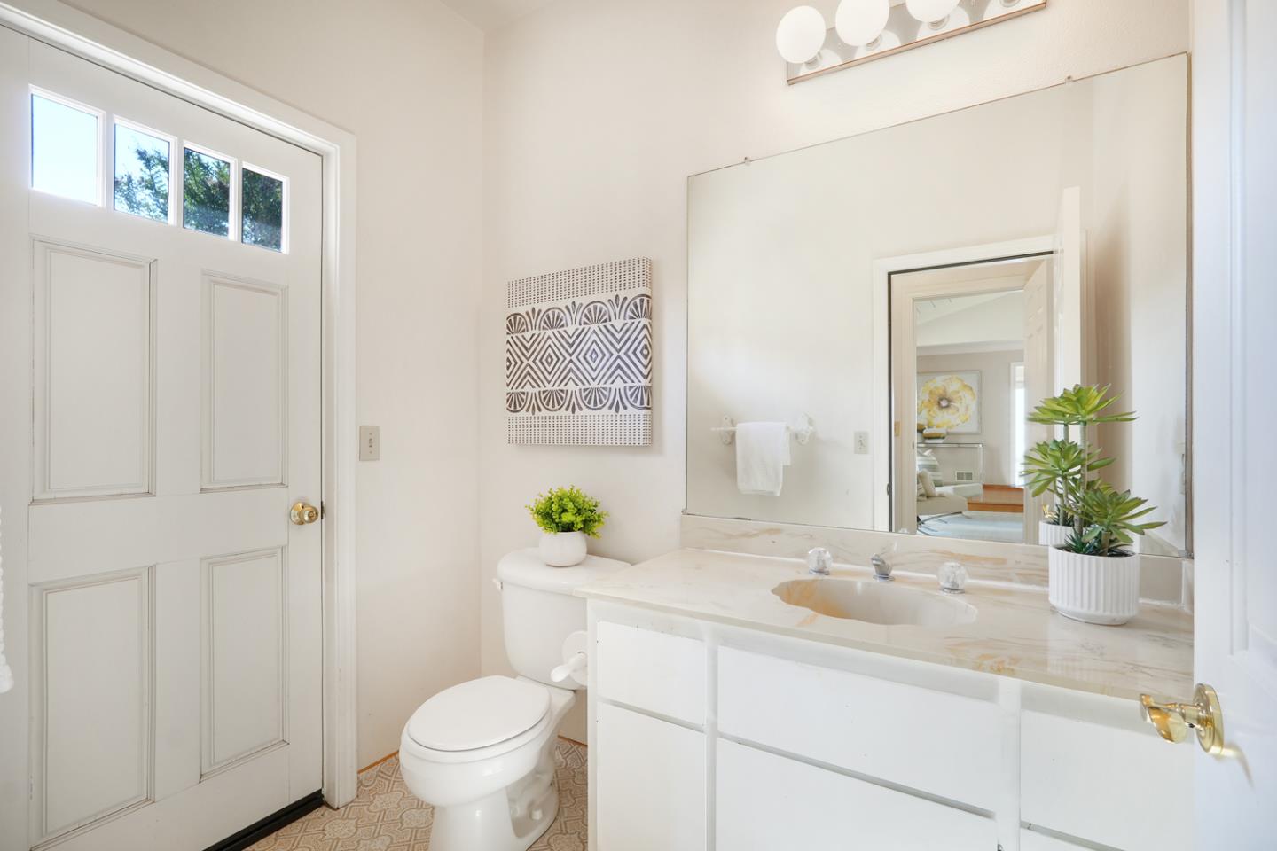 19573 Almaden Road San Jose, CA 95120 - Photo 12 of 41 a bathroom with a sink a toilet and a mirror