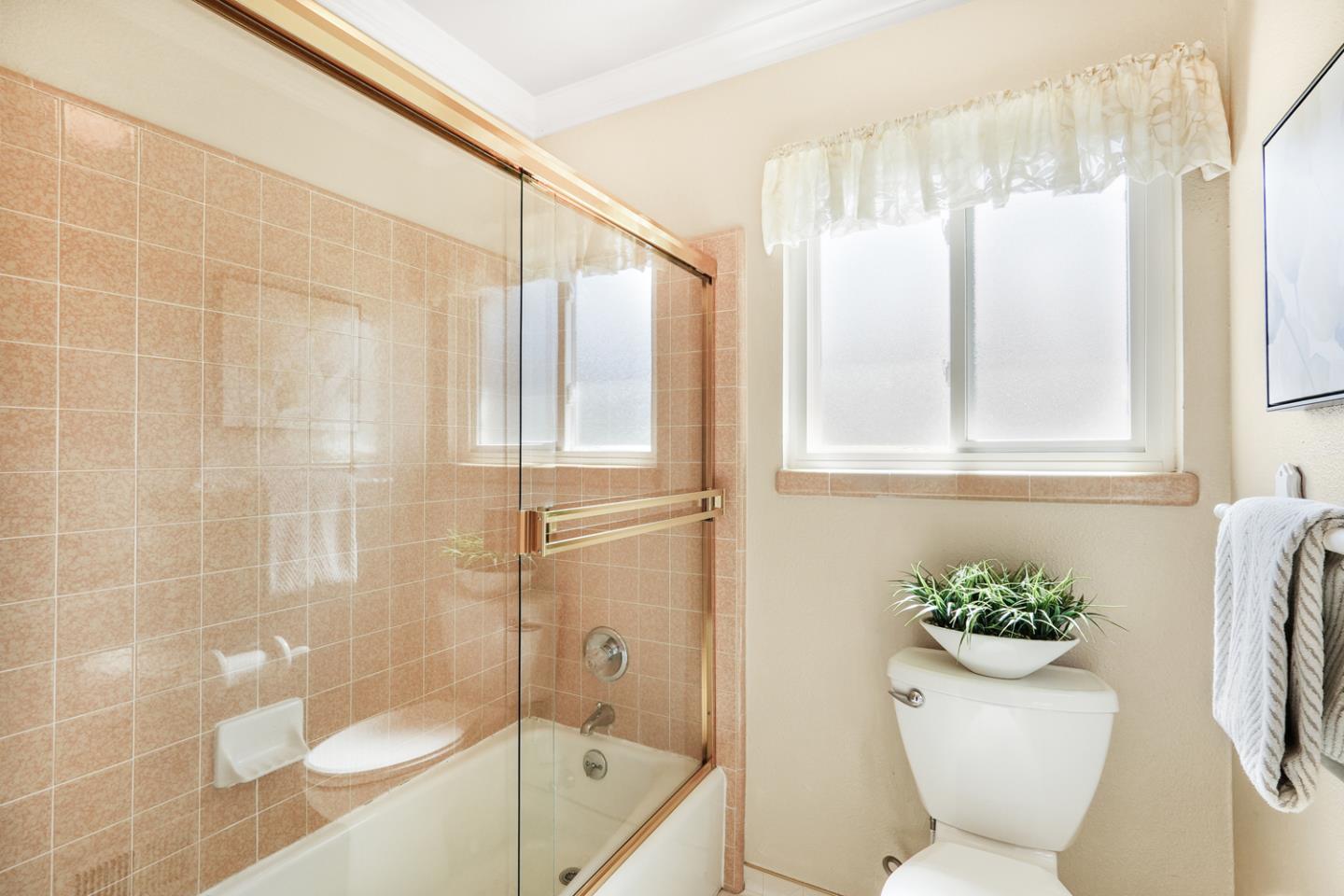 19573 Almaden Road San Jose, CA 95120 - Photo 22 of 41 a bathroom with a shower and a toilet