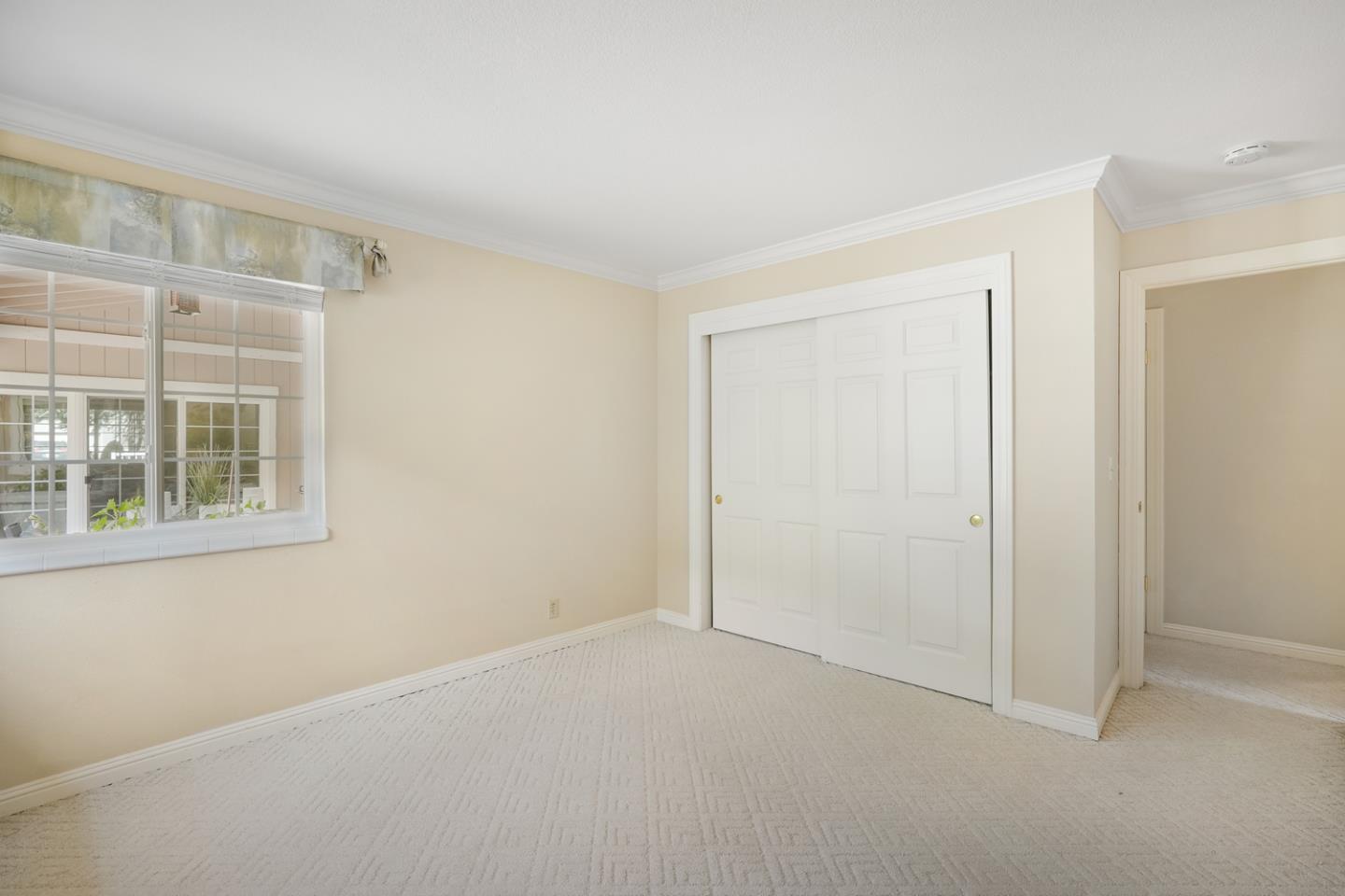 19573 Almaden Road San Jose, CA 95120 - Photo 26 of 41 a view of an empty room with a window