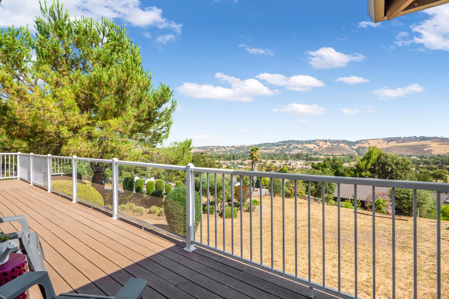19573 Almaden Road San Jose, CA 95120 - Photo 27 of 41 a view of a balcony with wooden floor & fence