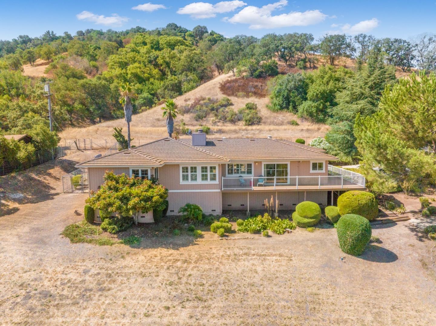 19573 Almaden Road San Jose, CA 95120 - Photo 33 of 41 a front view of a house with a yard
