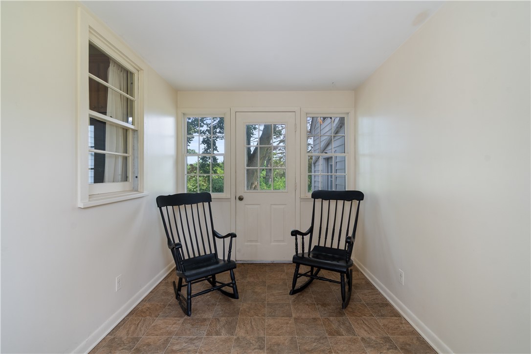 6592 Tuckahoe Road Williamson, NY 14589 - Photo 7 of 40 The BREEZEWAY- a convenient exit to the rear patio and attached garage