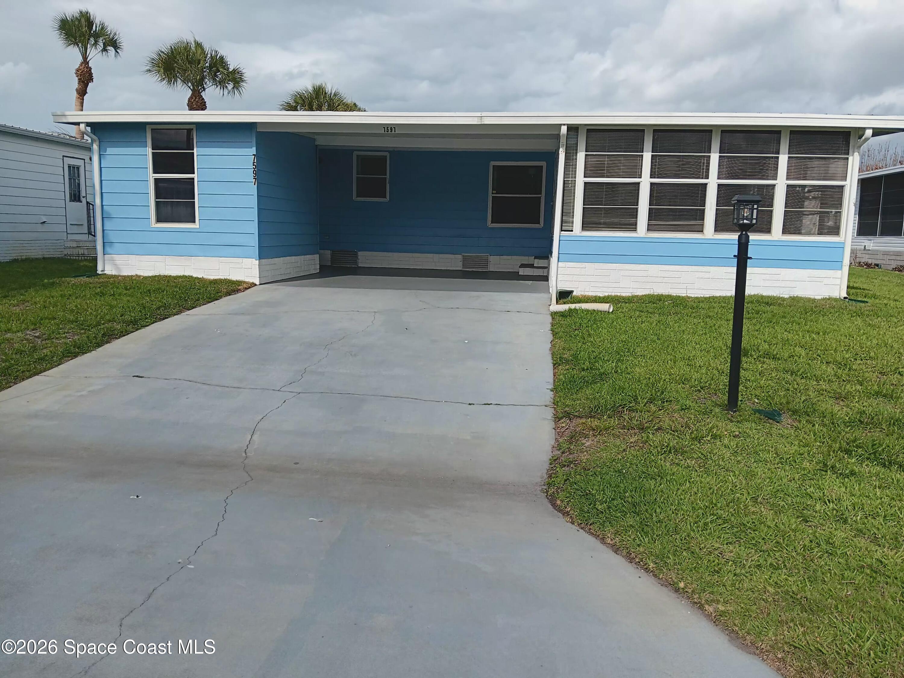 7597 Cedar Bark Road Micco, FL 32976 - Photo 2 of 28 20260423_165506