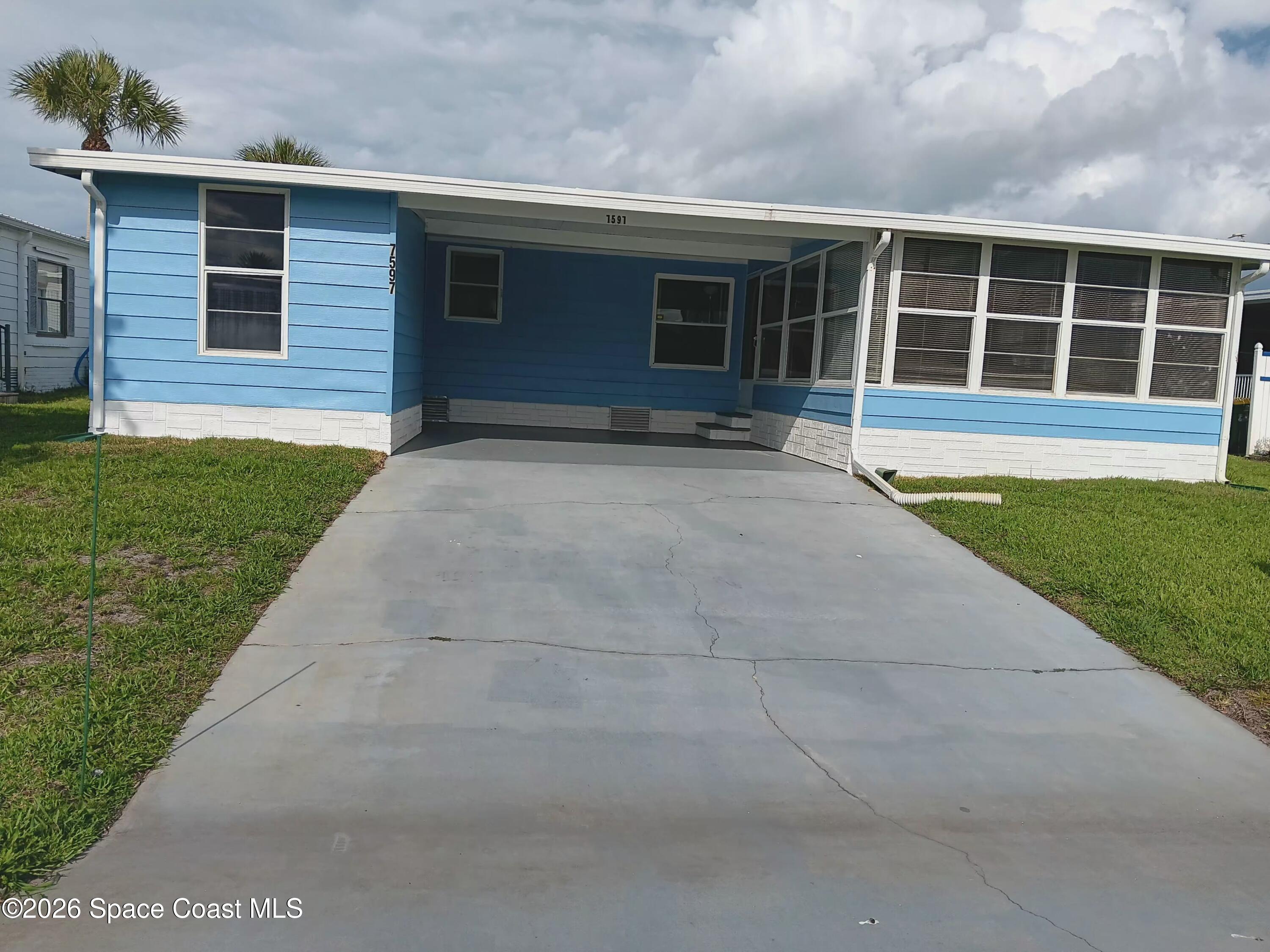 7597 Cedar Bark Road Micco, FL 32976 - Photo 3 of 28 20260423_165449