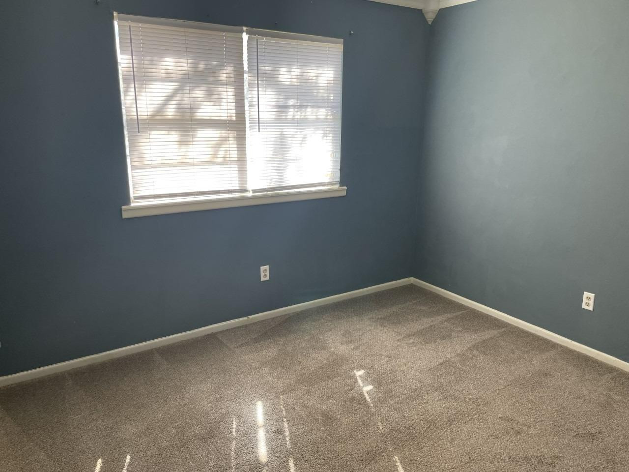 4832 9th Street Lubbock, TX 79416 - Photo 8 of 10 an empty room with a window