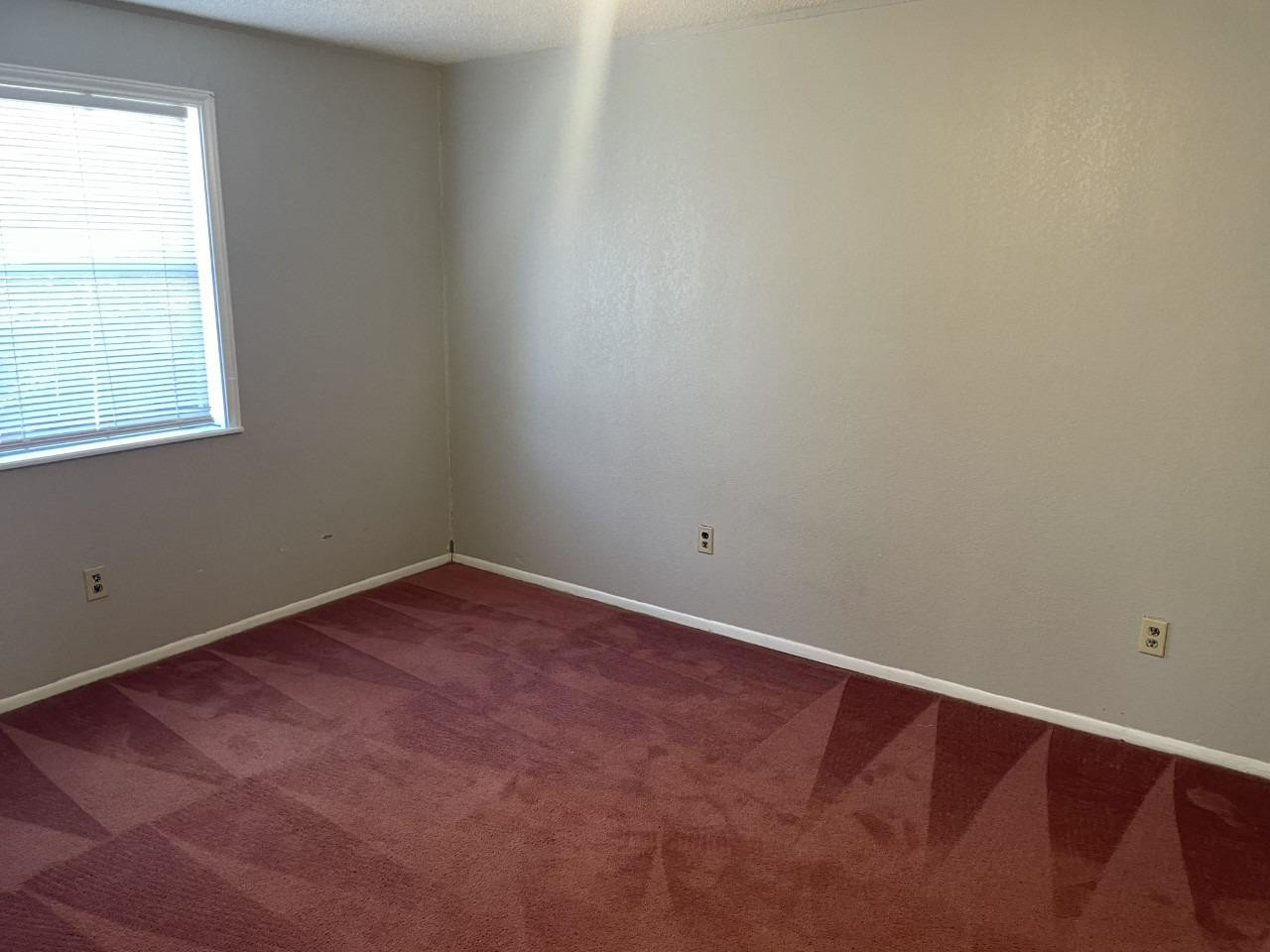 4832 9th Street Lubbock, TX 79416 - Photo 10 of 10 an empty room with a window