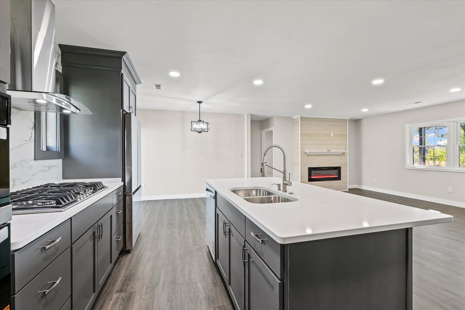 402 Beeson Road Urbana, IL 61802 - Photo 12 of 33 a kitchen that has a lot of cabinets a sink and a stove