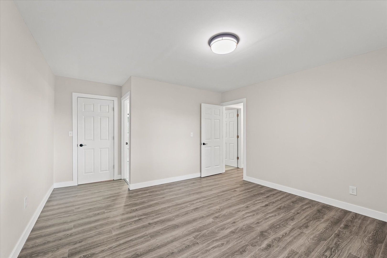 402 Beeson Road Urbana, IL 61802 - Photo 22 of 33 a view of an empty room with wooden floor