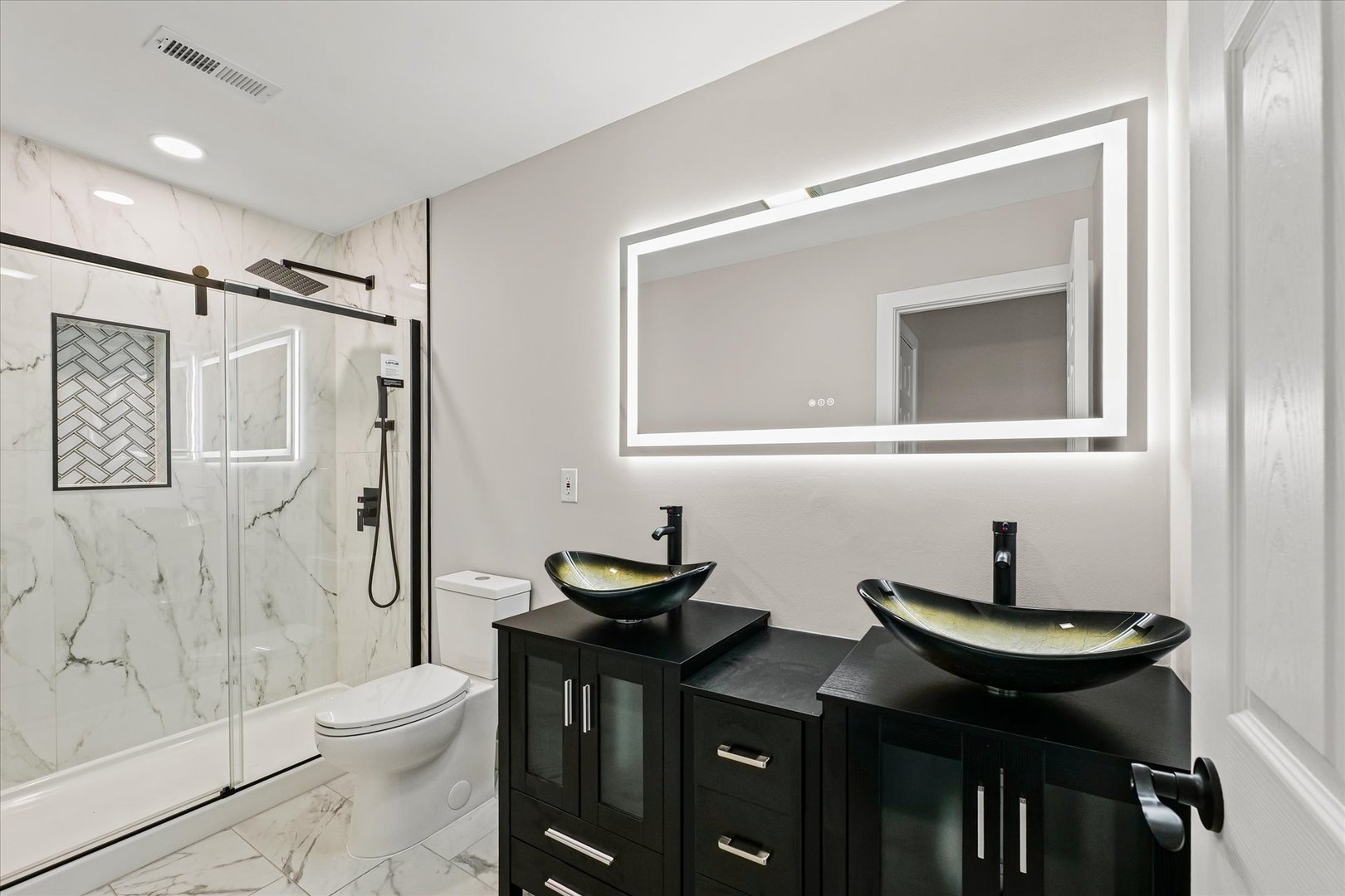 402 Beeson Road Urbana, IL 61802 - Photo 23 of 33 a bathroom with a sink and a mirror