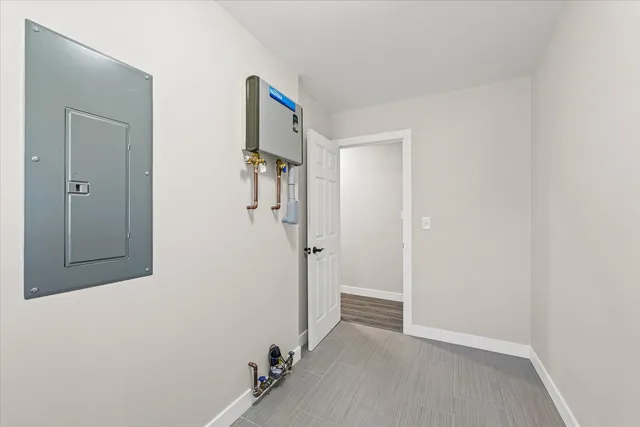 a view of a room with white walls