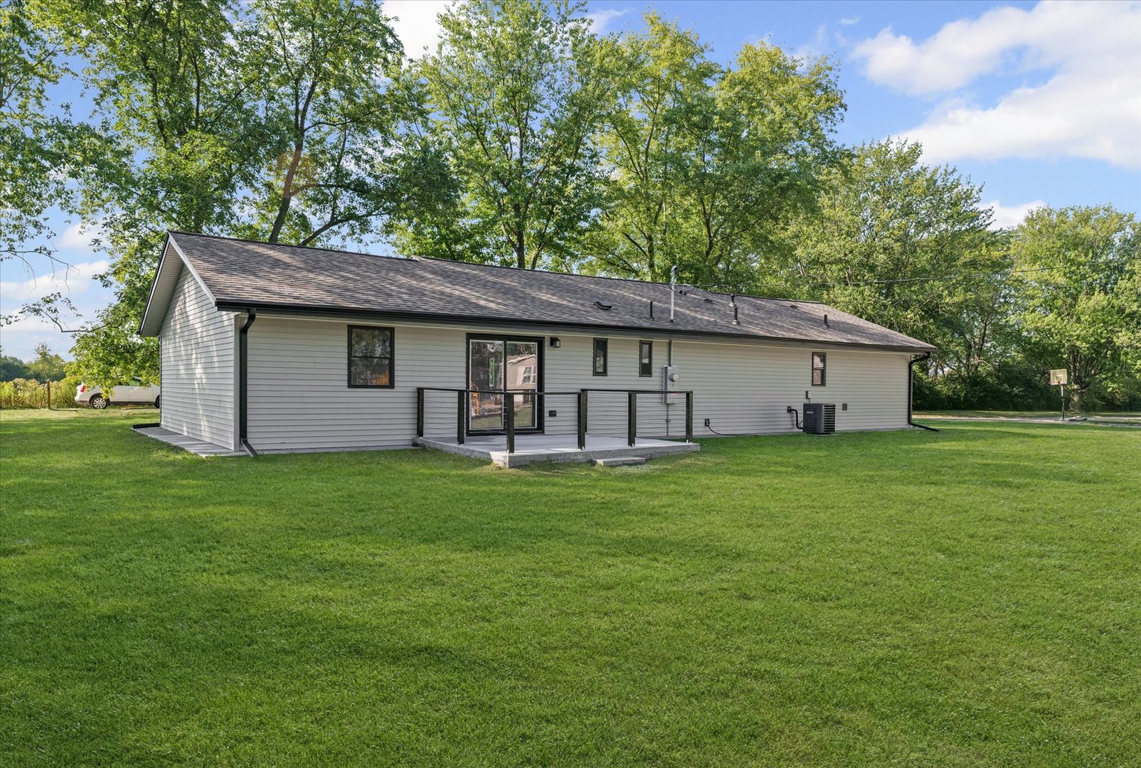 402 Beeson Road Urbana, IL 61802 - Photo 31 of 33 a view of a house with backyard and garden