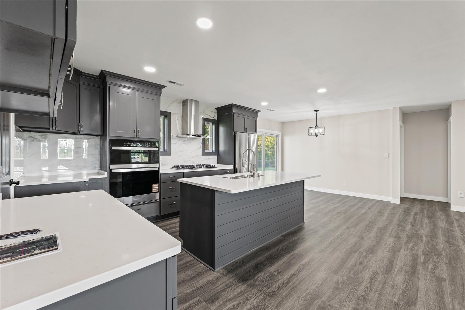402 Beeson Road Urbana, IL 61802 - Photo 9 of 33 a kitchen with kitchen island sink stove and cabinets