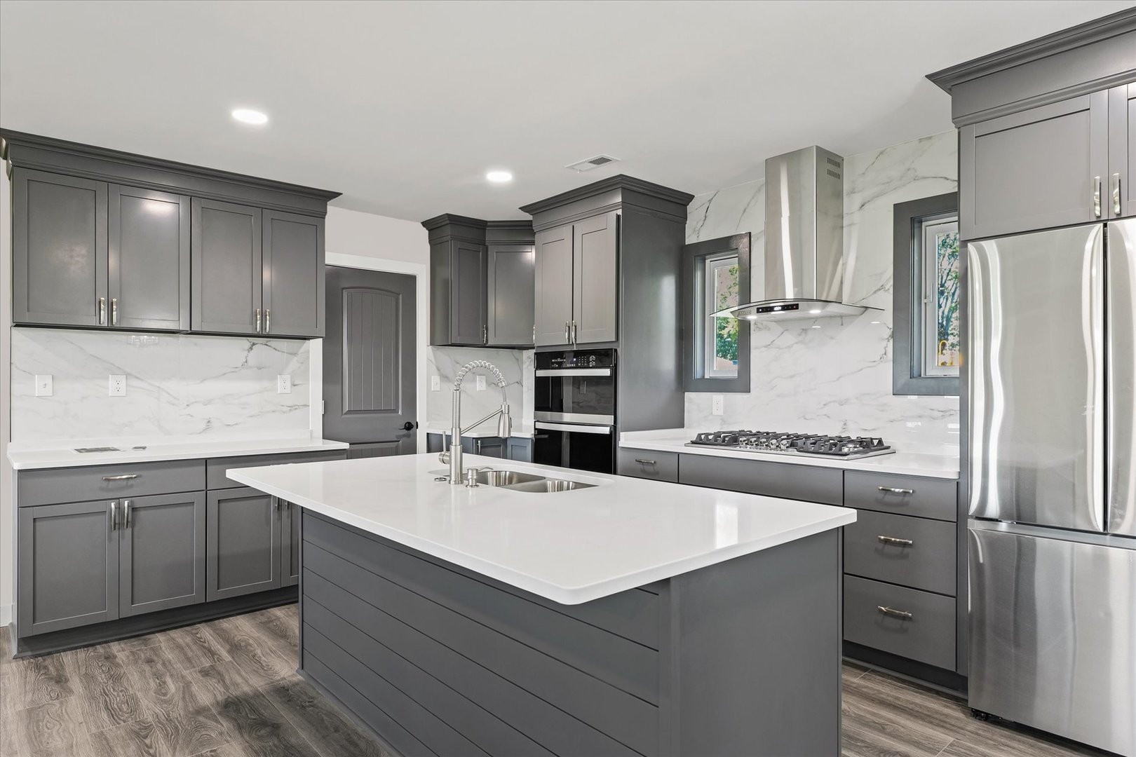 402 Beeson Road Urbana, IL 61802 - Photo 10 of 33 a kitchen with a sink refrigerator and cabinets