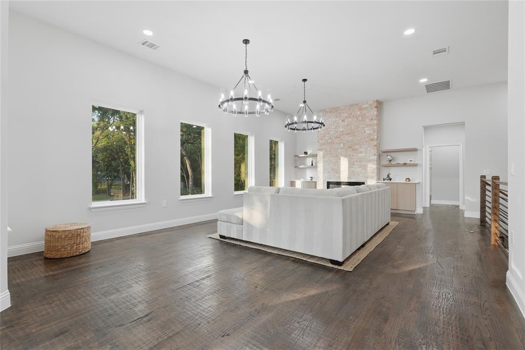 2150 Lakeview Mabank, TX 75156 - Photo 15 of 36 a large white kitchen with a large window and stainless steel appliances
