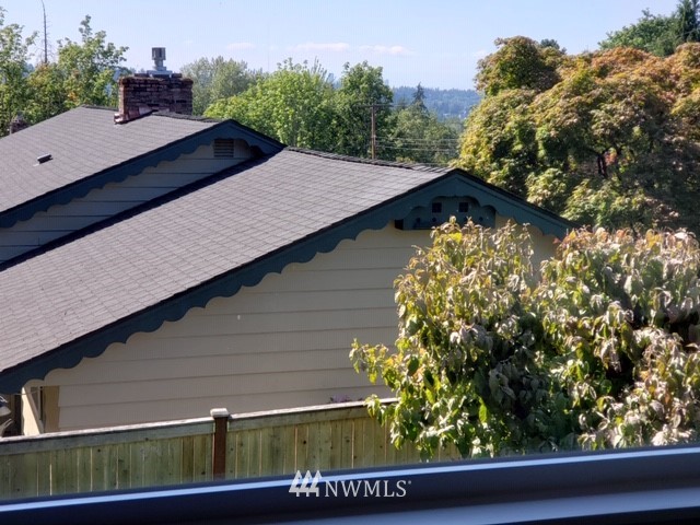 12833 Southeast 45th Place Bellevue, WA 98006 - Photo 14 of 40 a view of a yard from a balcony