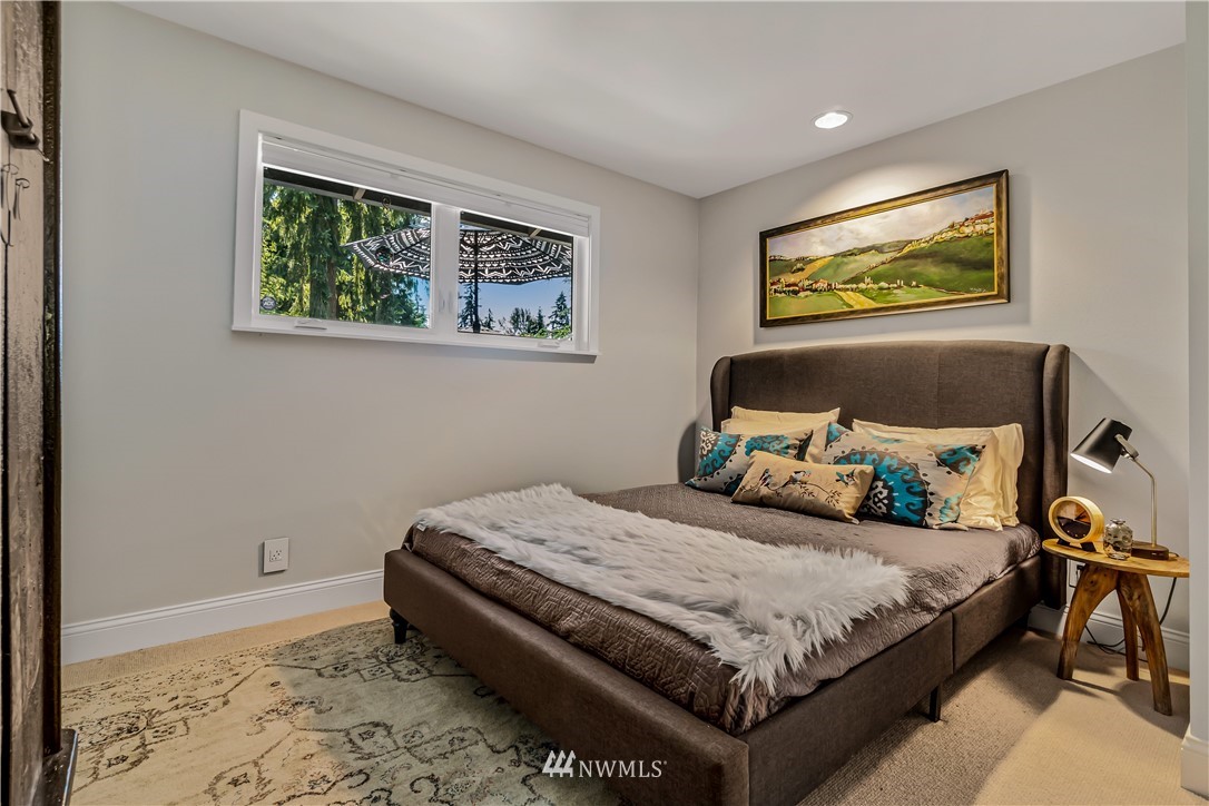 12833 Southeast 45th Place Bellevue, WA 98006 - Photo 22 of 40 a bedroom with a bed and a window