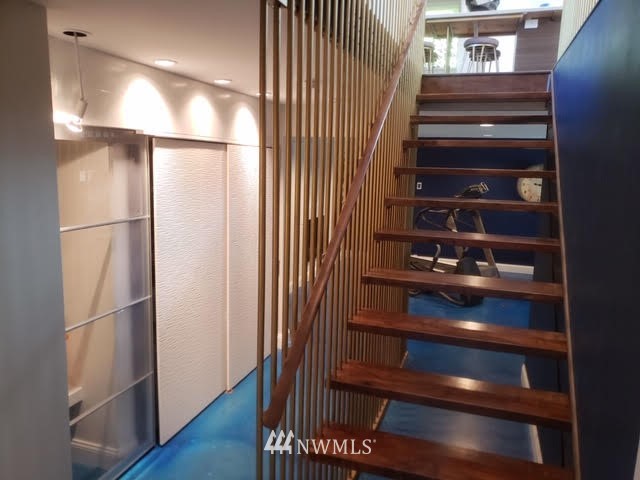 12833 Southeast 45th Place Bellevue, WA 98006 - Photo 24 of 40 a view of walk in closet with empty racks