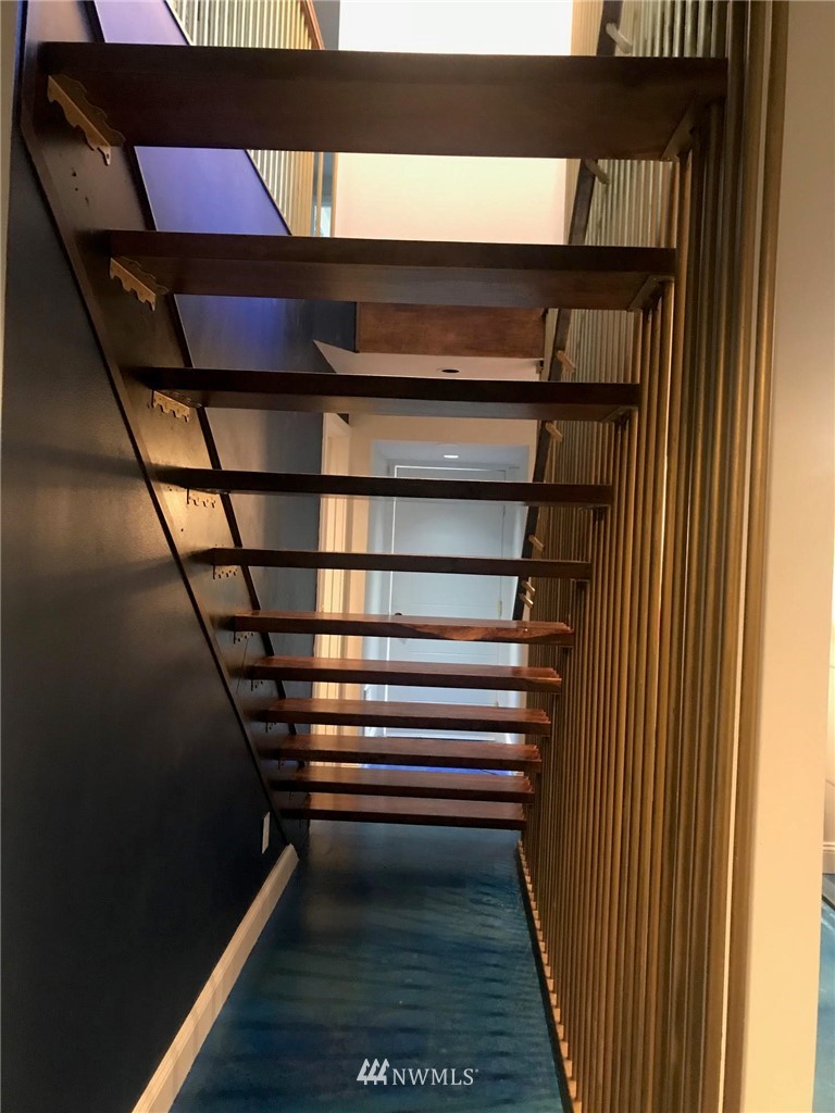 12833 Southeast 45th Place Bellevue, WA 98006 - Photo 25 of 40 a view of entryway with wooden floor