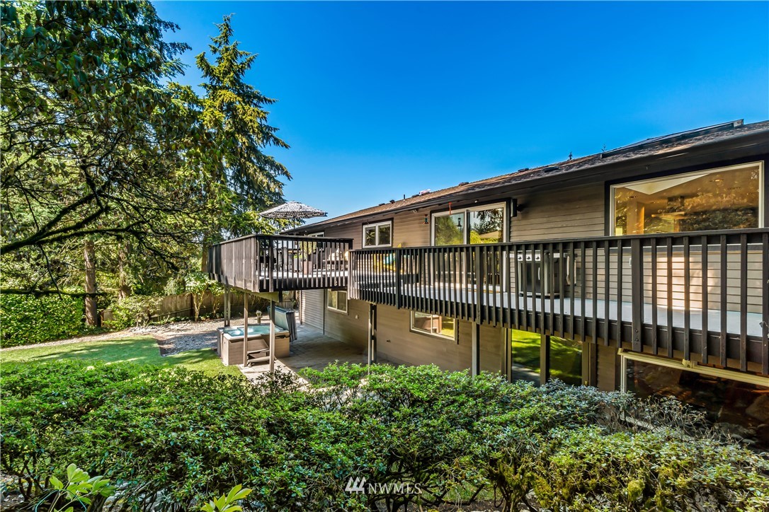 12833 Southeast 45th Place Bellevue, WA 98006 - Photo 35 of 40 a view of a chair and table in the backyard