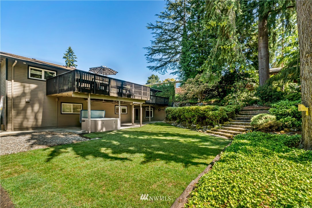12833 Southeast 45th Place Bellevue, WA 98006 - Photo 38 of 40 a front view of a house with a yard