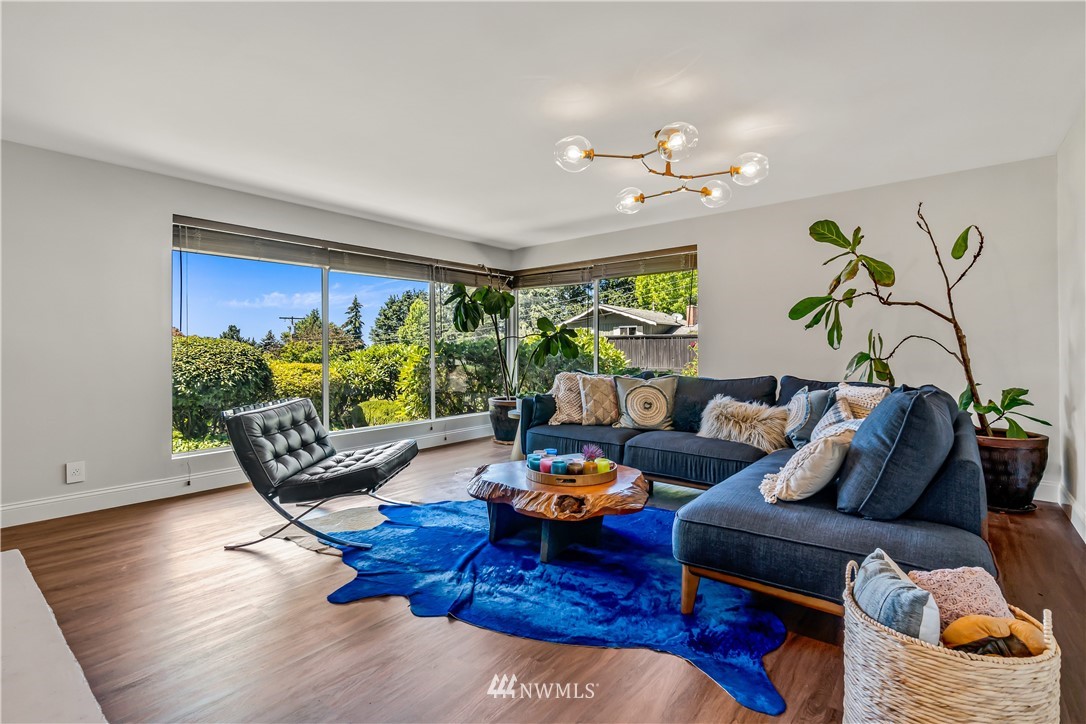 12833 Southeast 45th Place Bellevue, WA 98006 - Photo 5 of 40 a living room with furniture and wooden floor