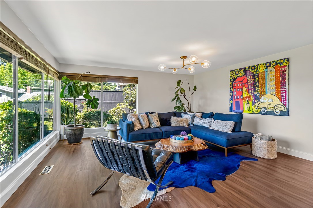 12833 Southeast 45th Place Bellevue, WA 98006 - Photo 7 of 40 a living room with furniture and a large window