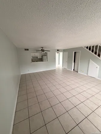 a view of a livingroom and entryway