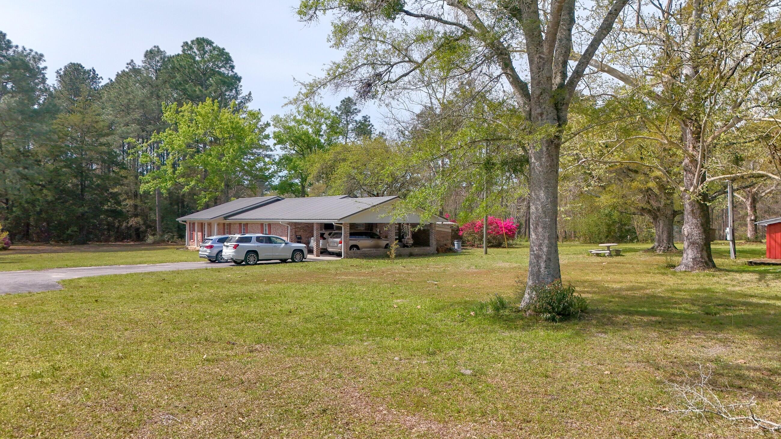 2374 Co Highway 280A DeFuniak Springs, FL 32435 - Photo 13 of 66 a fire hydrant in the middle of a field