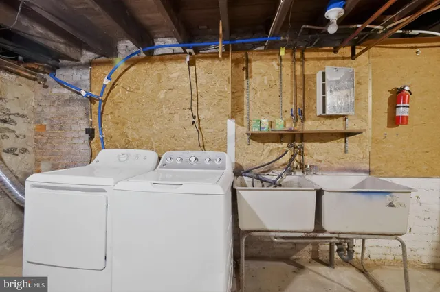 a utility room with dryer and washer