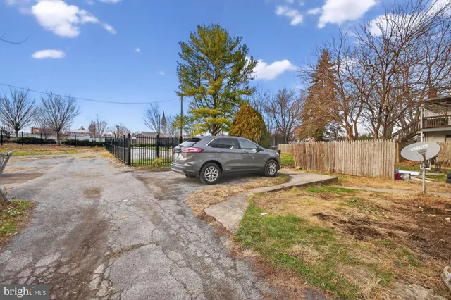 a car parked in front of a house