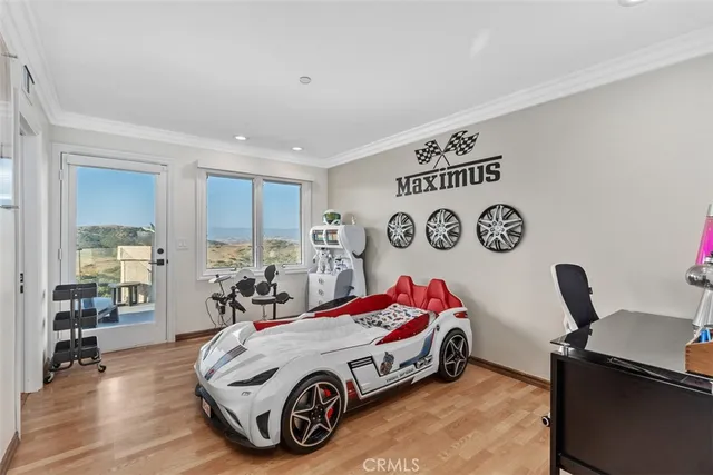 a bedroom with a bed and a table in it