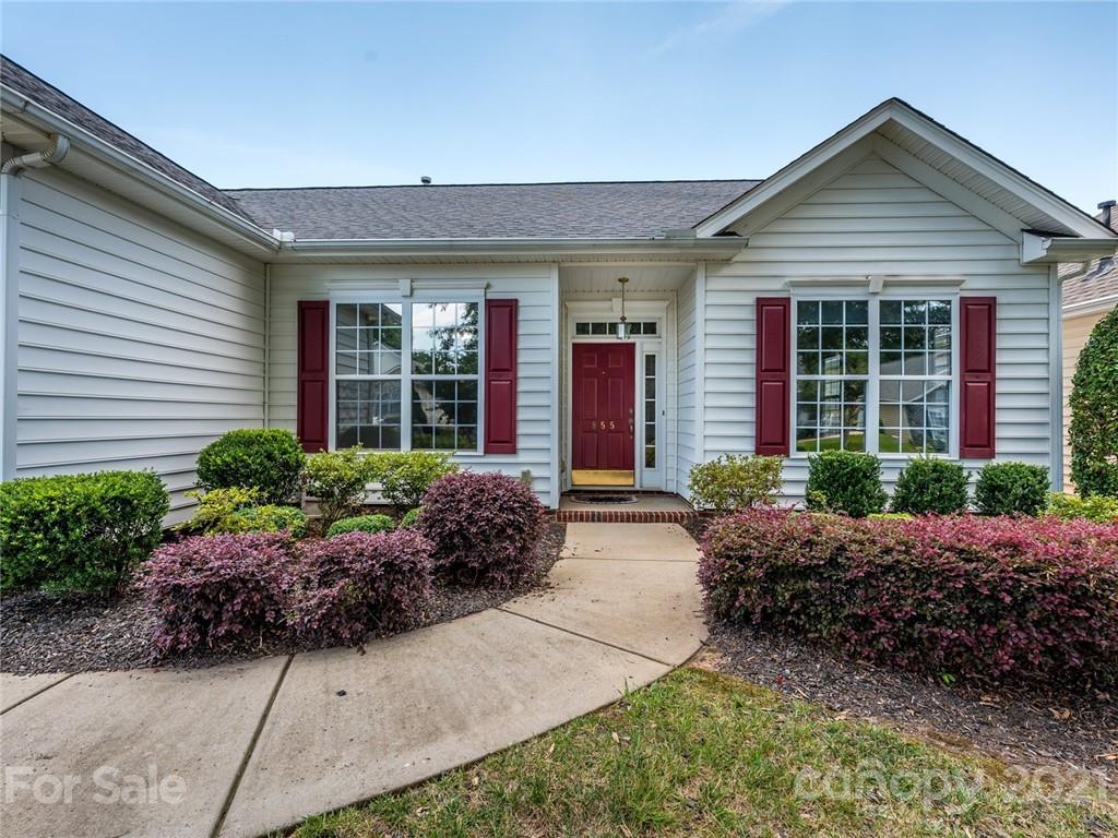 955 Platinum Drive Fort Mill, SC 29708 - Photo 2 of 37 a front view of a house with garden