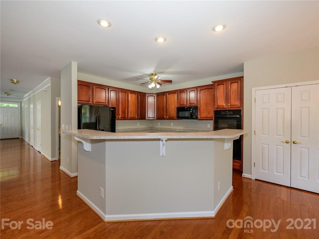 955 Platinum Drive Fort Mill, SC 29708 - Photo 12 of 37 a view of kitchen with furniture and wooden floor