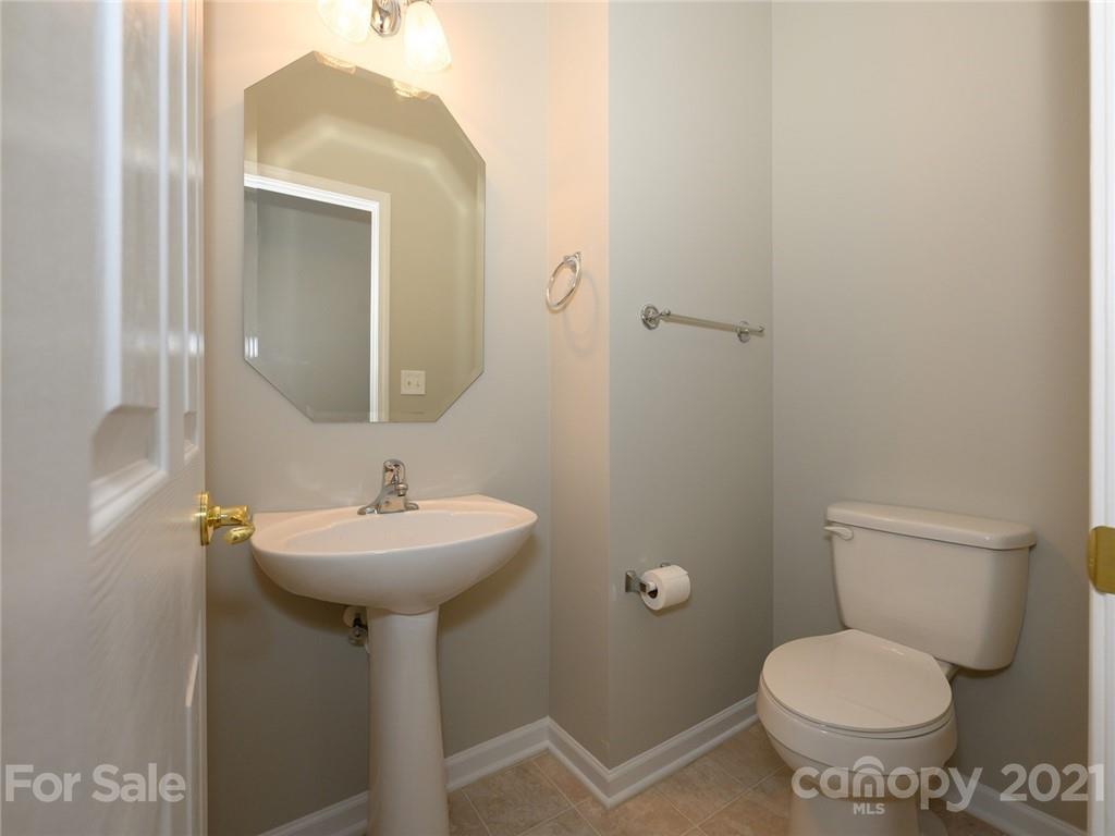 955 Platinum Drive Fort Mill, SC 29708 - Photo 22 of 37 a bathroom with a toilet sink and mirror