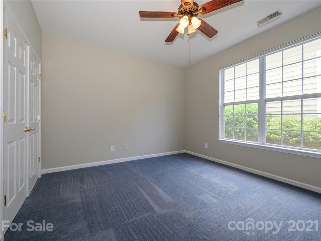 955 Platinum Drive Fort Mill, SC 29708 - Photo 28 of 37 an empty room with a window and a fan