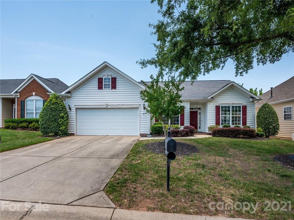 955 Platinum Drive Fort Mill, SC 29708 - Photo 37 of 37 a front view of a house with a yard and garage