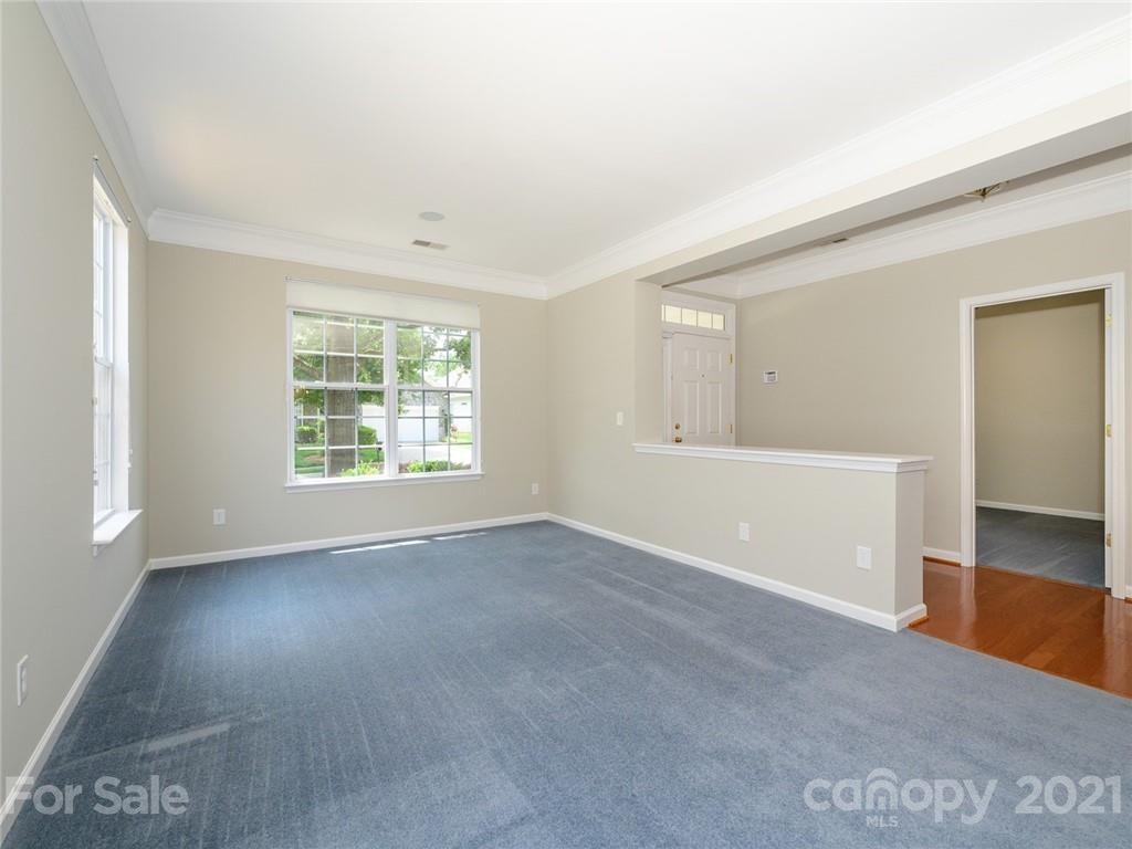 955 Platinum Drive Fort Mill, SC 29708 - Photo 6 of 37 an empty room with wooden floor and windows