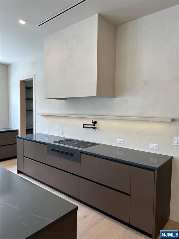 2 Maple Street Englewood Cliffs, NJ 07632 - Photo 11 of 44 a bathroom with a sink and a mirror