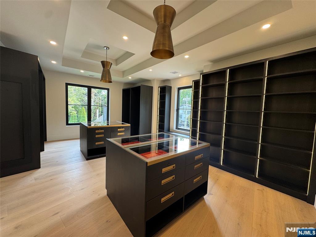 2 Maple Street Englewood Cliffs, NJ 07632 - Photo 23 of 44 a living room with furniture and a flat screen tv