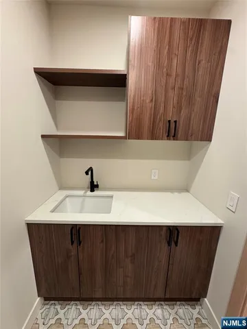 a bathroom with a toilet a sink and a bathtub