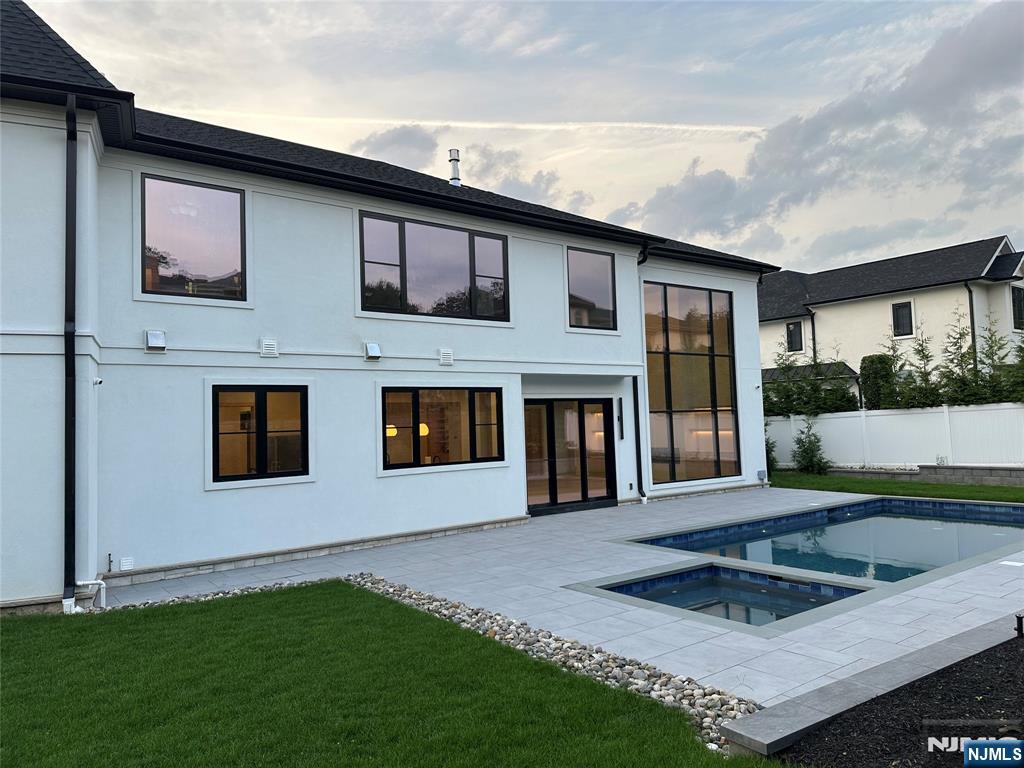 2 Maple Street Englewood Cliffs, NJ 07632 - Photo 43 of 44 a front view of a house with garden