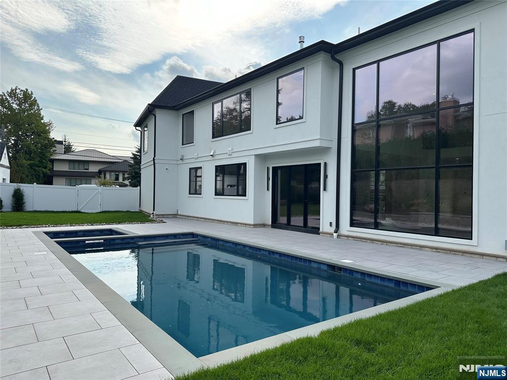 2 Maple Street Englewood Cliffs, NJ 07632 - Photo 44 of 44 a view of a house with a tub and a yard