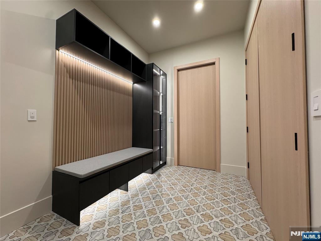 2 Maple Street Englewood Cliffs, NJ 07632 - Photo 6 of 44 a bedroom with a bed and a dresser