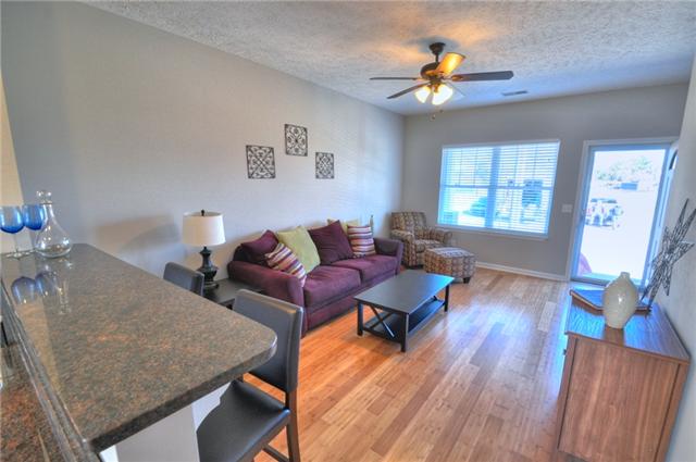 1104 Ransom Way Nashville, TN 37217 - Photo 4 of 12 a living room with furniture and a chandelier