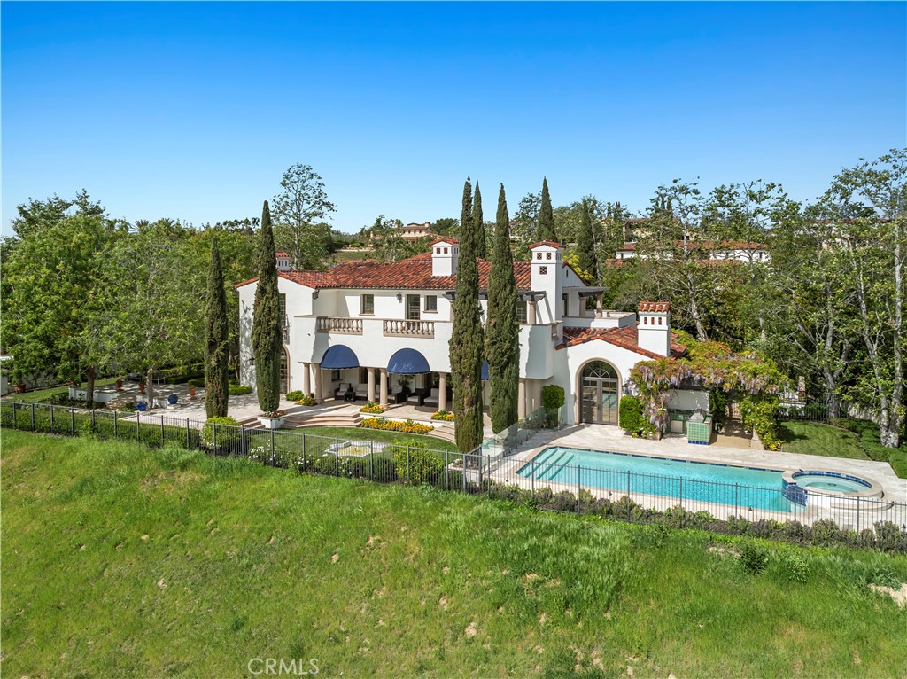 a view of a street with a building and a big yard