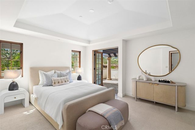 an aerial view of a house with outdoor space pool seating area and yard