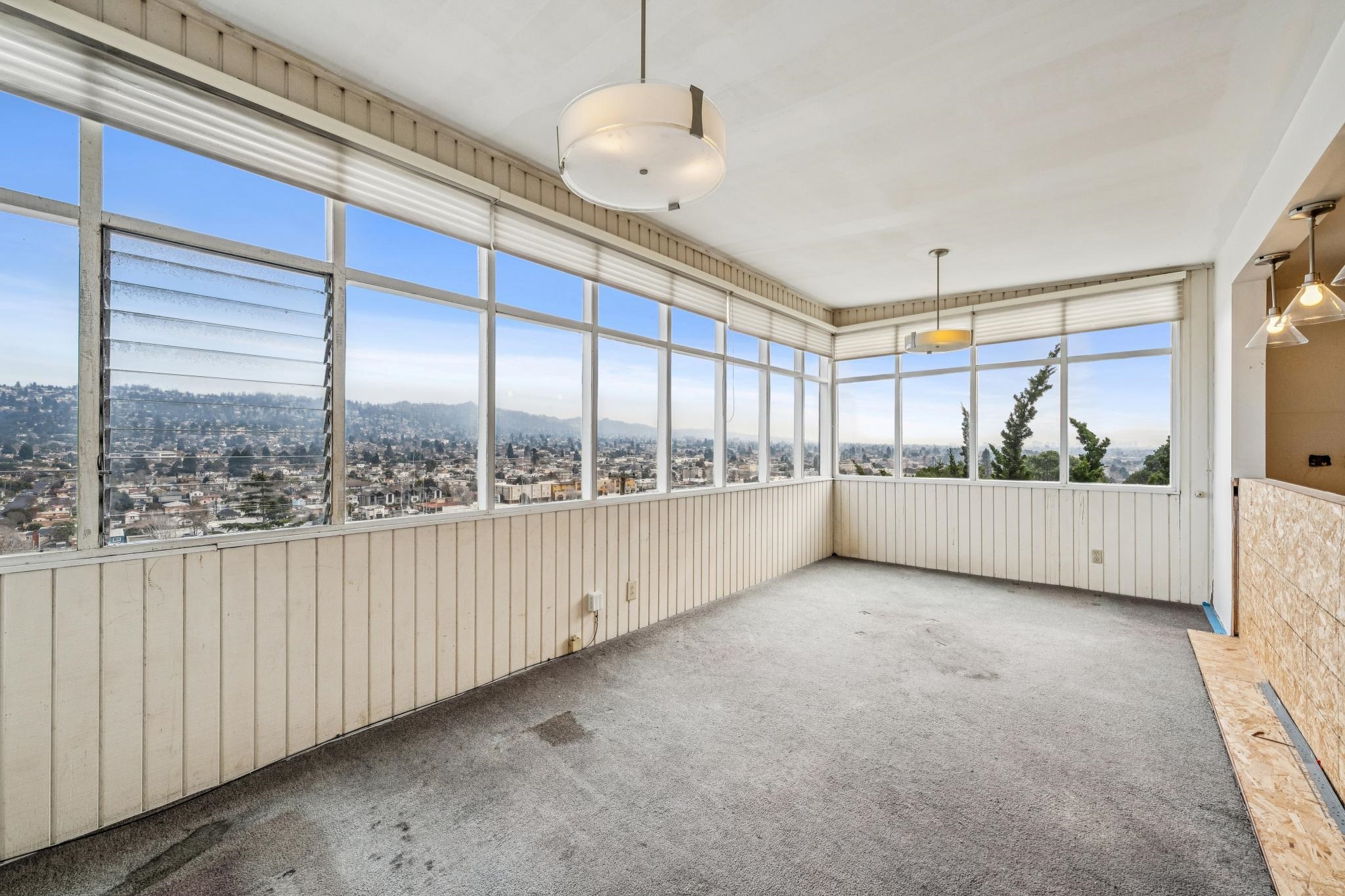 953 Hillside Avenue Albany, CA 94706 - Photo 11 of 48 a view of an empty room with a window