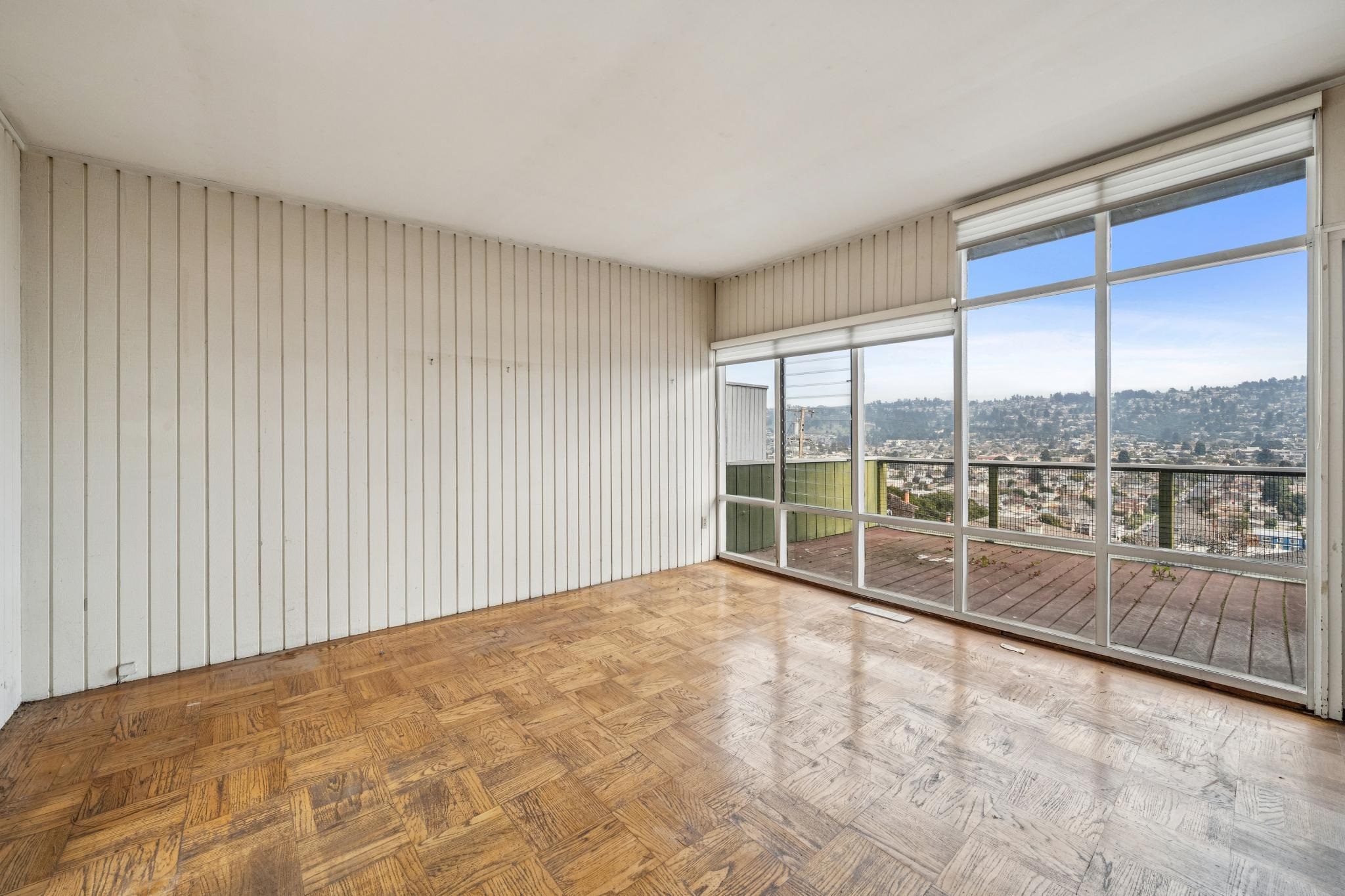 953 Hillside Avenue Albany, CA 94706 - Photo 21 of 48 a view of an empty room with a large window