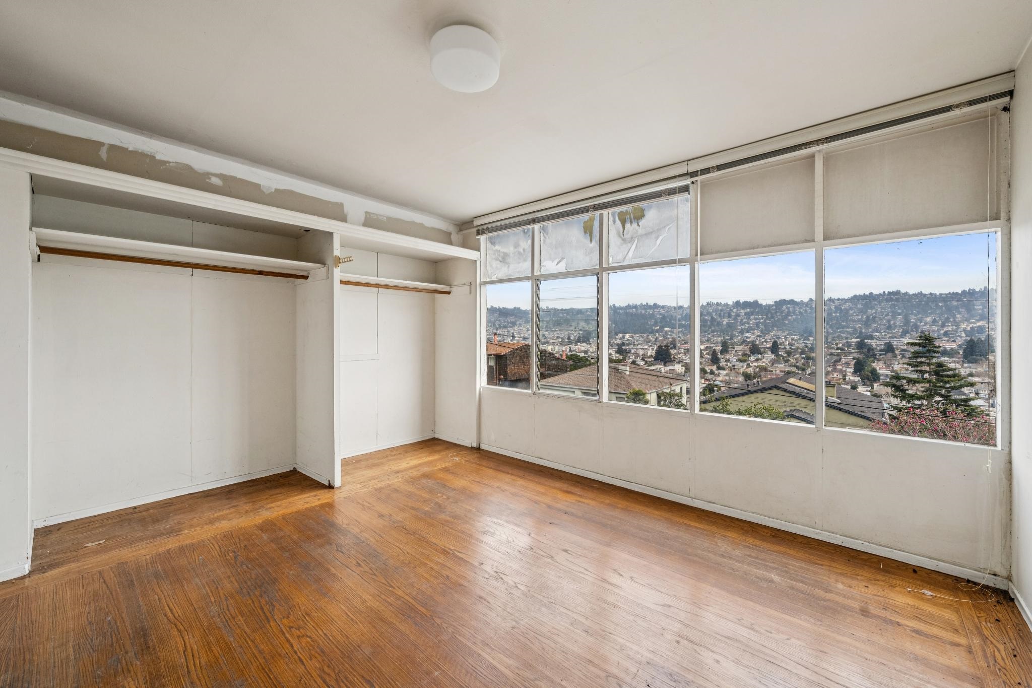 953 Hillside Avenue Albany, CA 94706 - Photo 37 of 48 a view of an empty room with a window