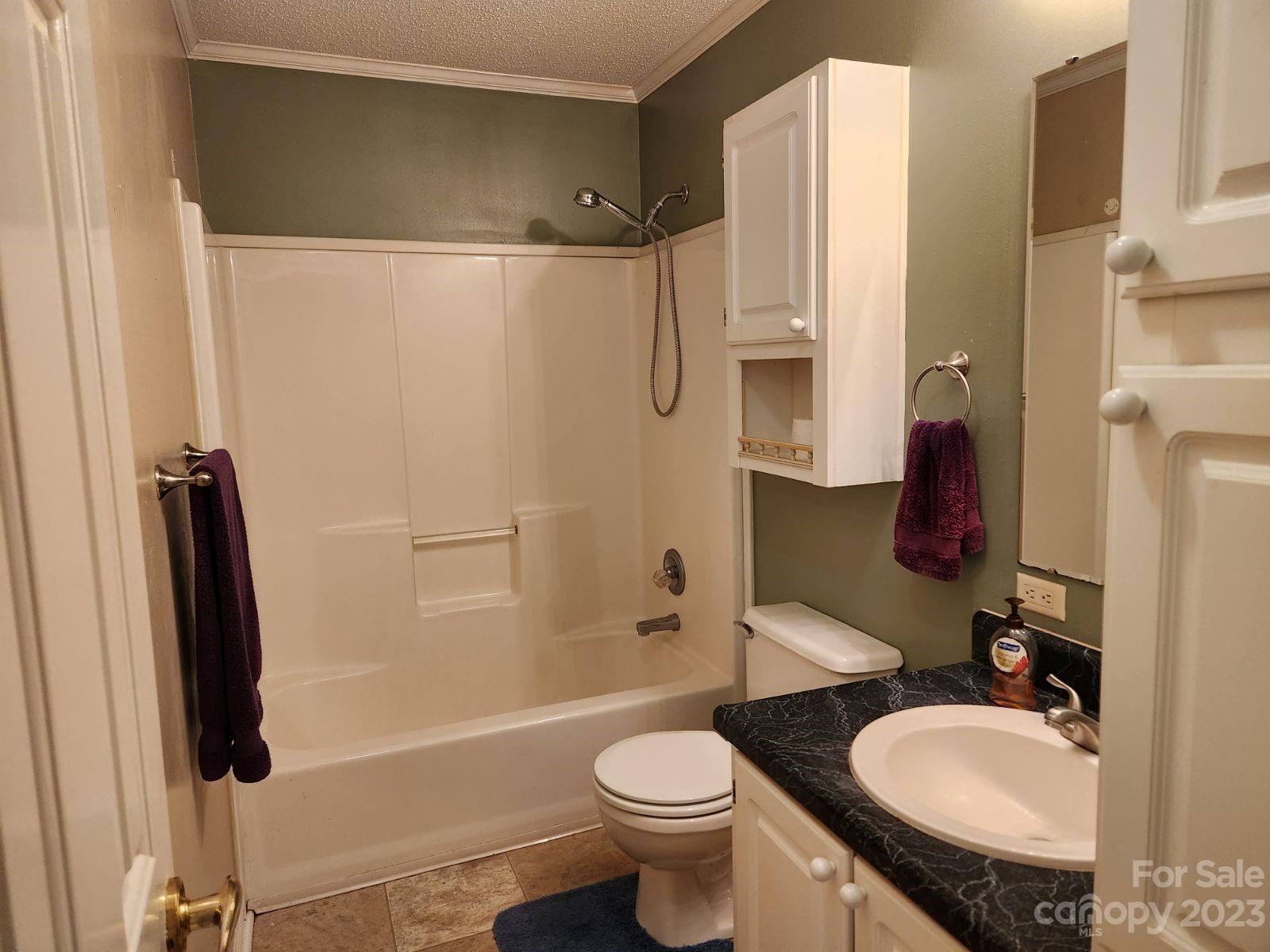 1952 Haire Road Fort Mill, SC 29715 - Photo 13 of 27 a bathroom with a sink toilet and shower